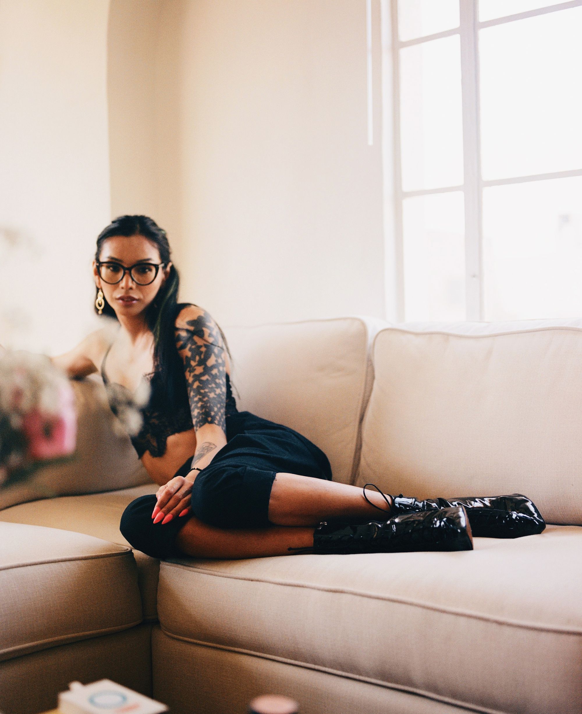 Daphne laying on sofa, photography by Texas Isaiah